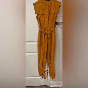 Beautiful belted jumpsuit with ankle ties